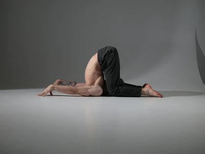 Elegant stretching motion of a yoga practitioner